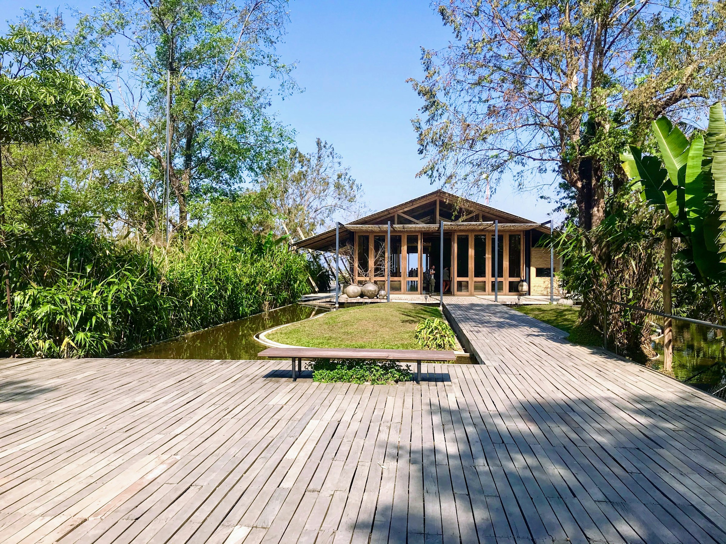 The Beach House deck overlooking the lagoon at the water's edge